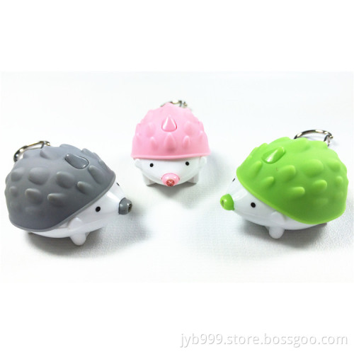 new cute designs animals shaped plastic hedgehog LED keychain